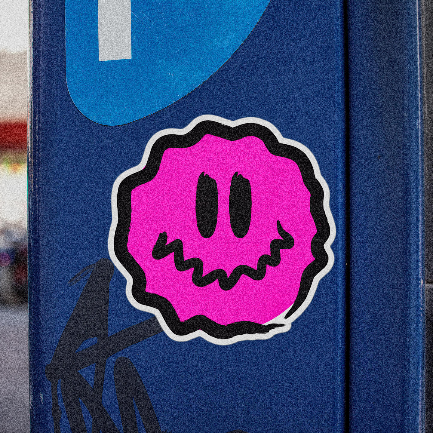 square-pink-antsy-face-round-sticker-on-a-blue-parking-meter.
